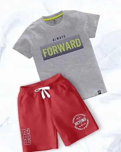 a grey shirt and red shorts